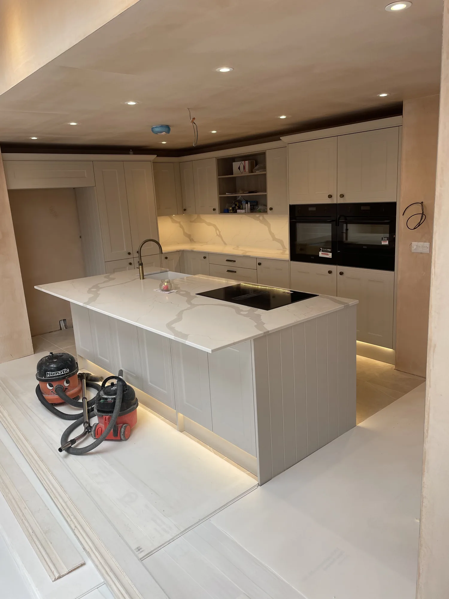 Kitchen nearing completion during a rewire