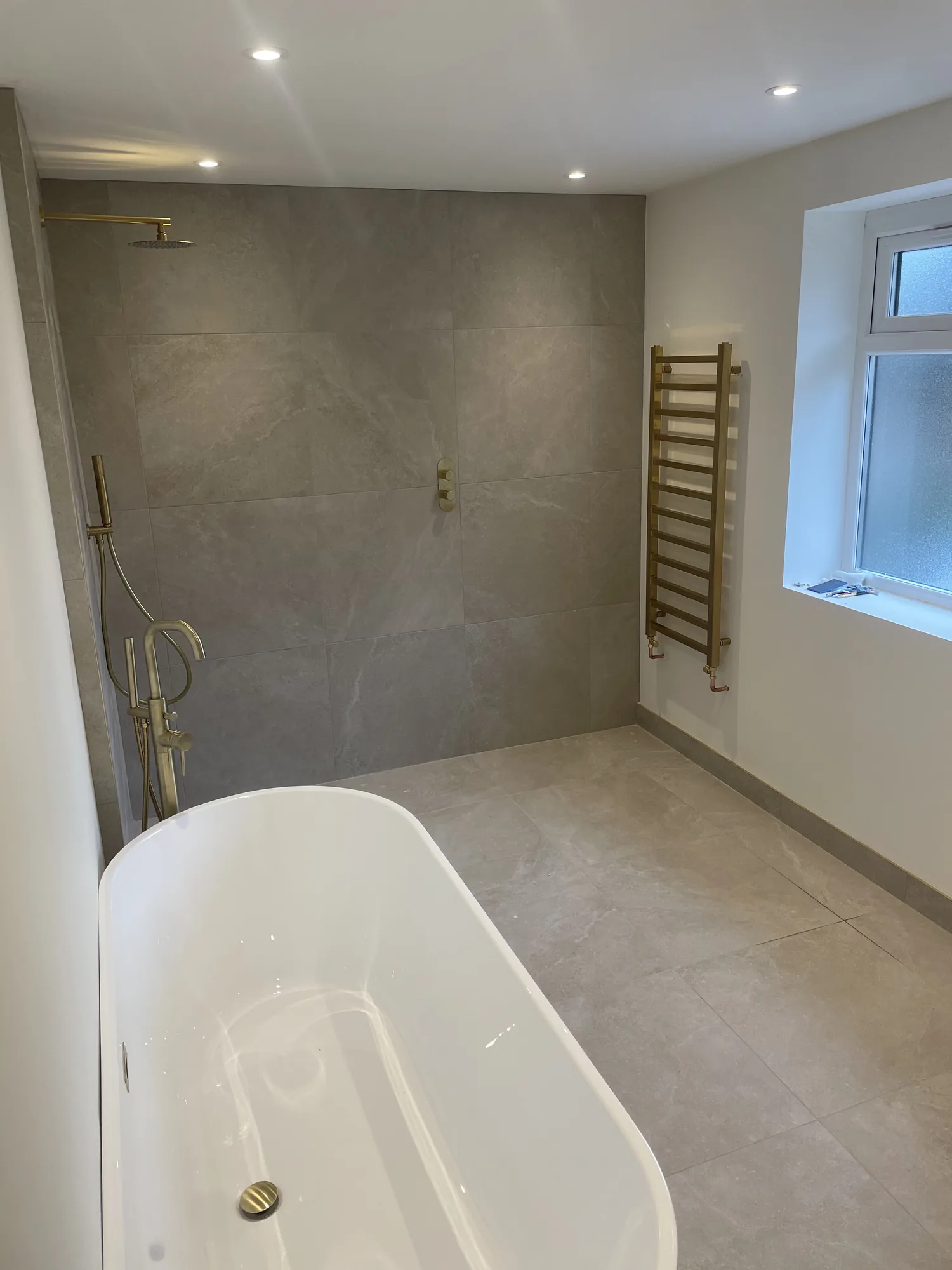 Rewired bathroom with new recessed lighting